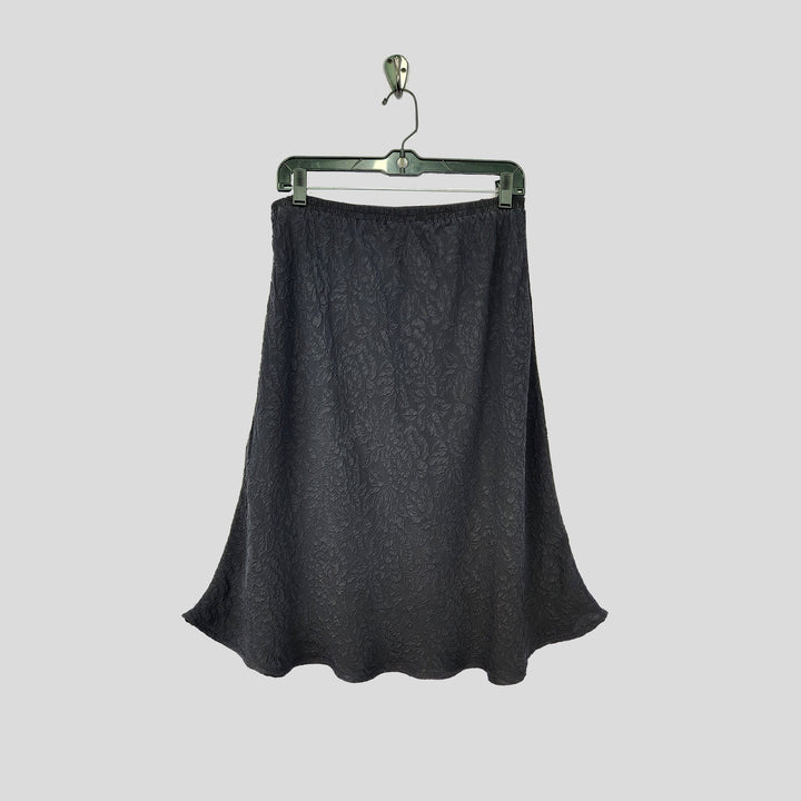 Knee Length Skirt in Black Textured Silk
