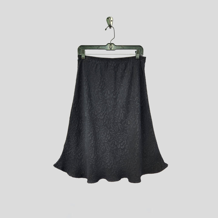Knee Length Skirt in Black Textured Silk